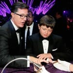 EXCLUSIVE - Stephen Colbert, left, and son attend the Governors Ball at the 66th Primetime Emmy Awards at the Nokia Theatre L.A. Live on Monday, Aug. 25, 2014, in Los Angeles. (Photo by Danny Moloshok/Invision for the Television Academy/AP Images)
