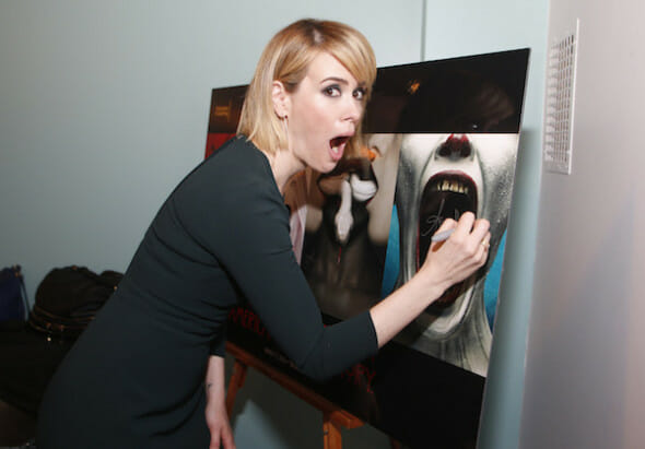Sarah Paulson signs the event poster backstage for the Television Academy’s member event, “An Evening with the Women of American Horror Story,” Tuesday, March 17, 2015