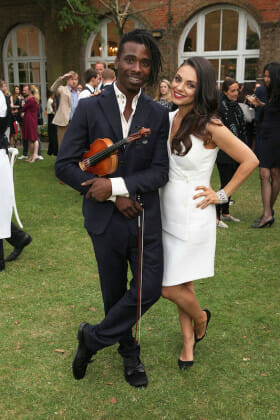 LONDON, ENGLAND - JUNE 23: Actress and Gemfields brand ambassador, Mila Kunis and Marques Toliver attend the launch of Gemfields Mozambican Rubies at The Orangery on June 23, 2015 in London, England. (Photo by David M. Benett/Getty Images for Gemfields) *** Local Caption *** Mila Kunis; Marques Toliver