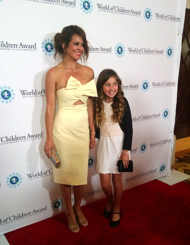 World of Children emcee Brooke Burke-Charvet and daugher - Brooke is in a Cushnie et Ochs dress, Gucci heels and jewelry by Jacquie Aiche.jpg