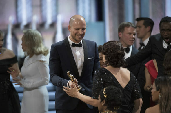 La La Land's FRED BERGER handing the Oscar to Ruth Negga after Gaff